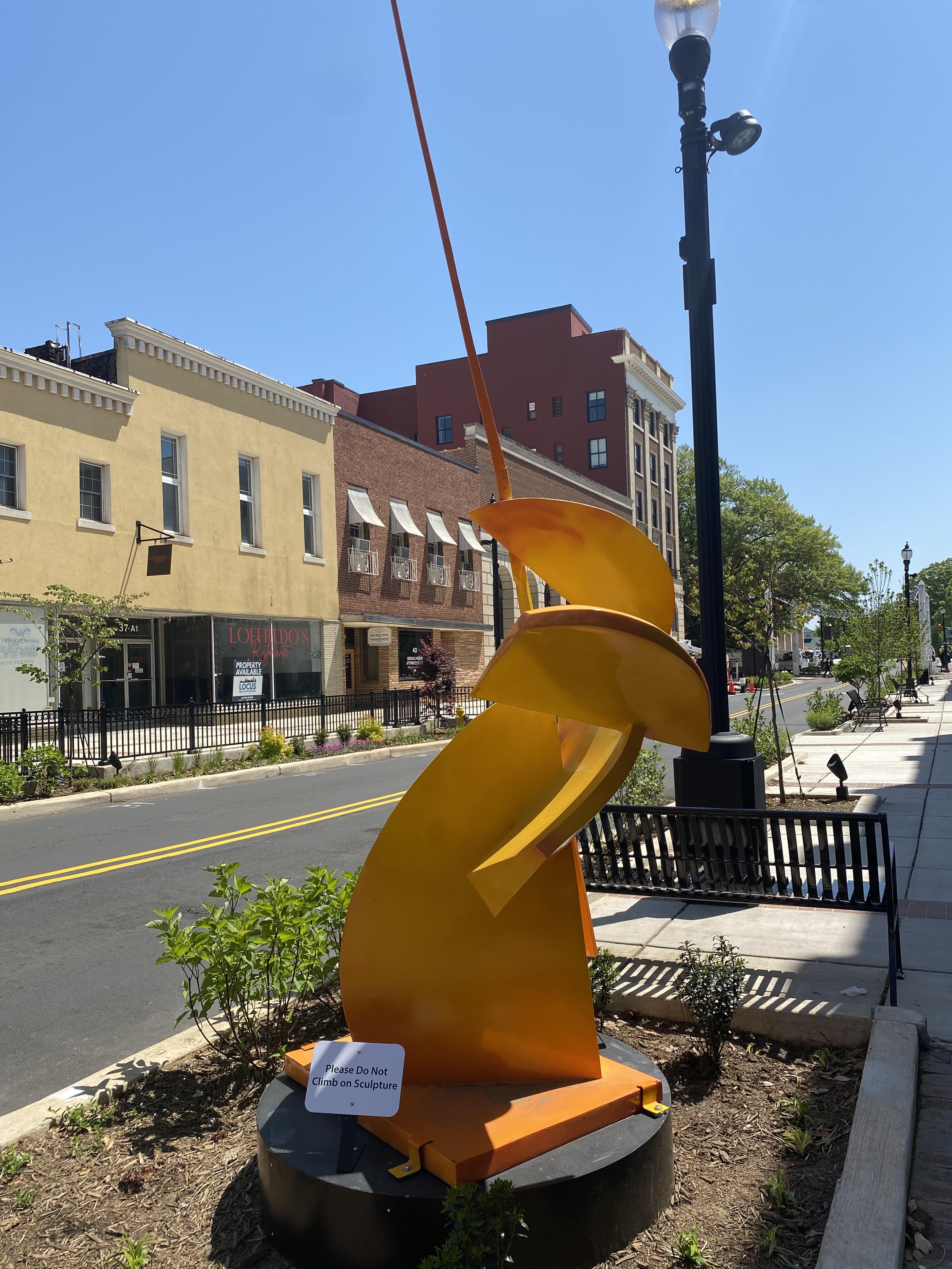 Side-view picture showing the "Intersection" sculpture in Downtown Concord